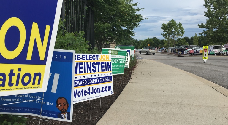 2018 campaign signs at the Miller Branch library