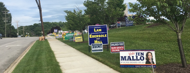 2018 campaign signs at the Miller Branch library