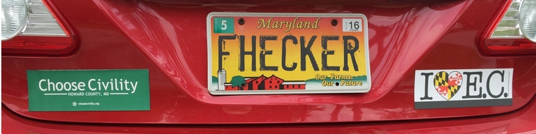 A copy of the revised banner for my web site, showing a (fake) license plate reading FHECKER, a Howard County Library System Choose Civility bumper sticker, and a bumper sticker reading I (heart) EC.